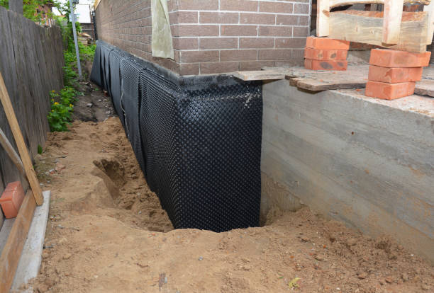 SJ Waterproofing Pros technician performing targeted Waterproofing assessment in Hammonton, NJ